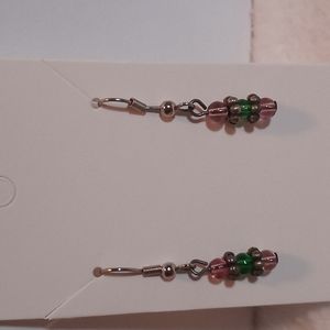 Silver toned hook earrings with pink and green glass beads